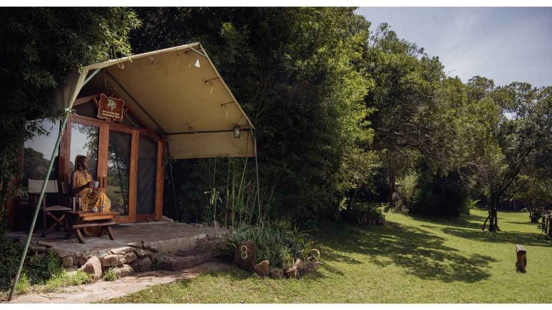 Spacious Bush Tent with private terrace overlooking the savanna at Exploreans Mara River Camp, Maasai Mara