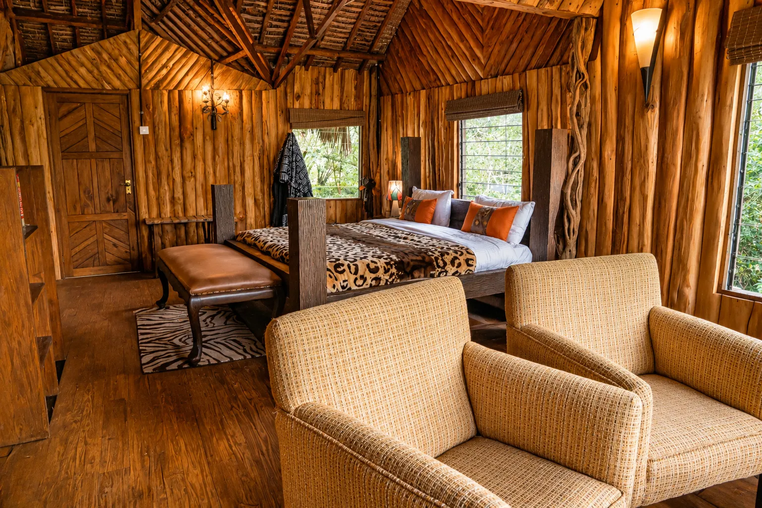 Simba's Den two-bedroom log cabin with river-view deck at Exploreans Mara River Camp, Maasai Mara Kenya