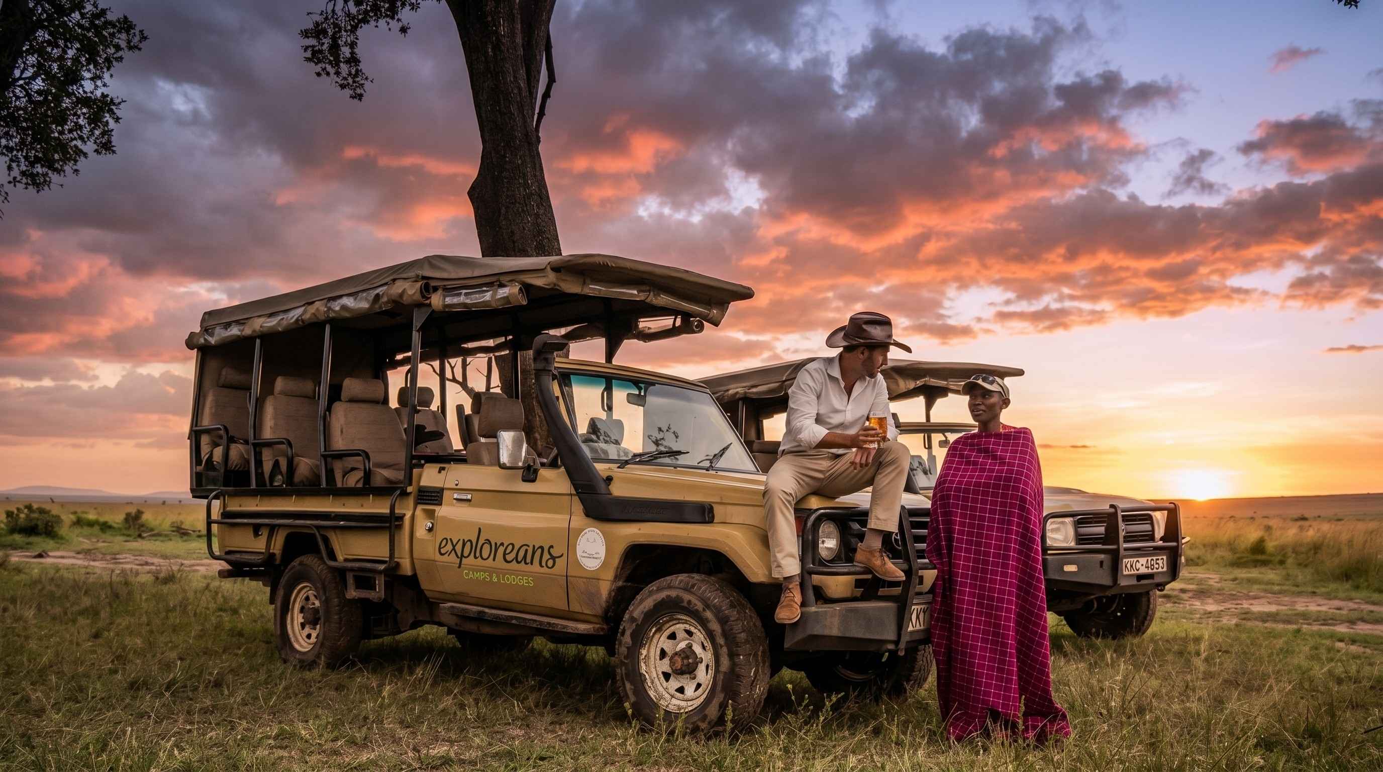 Safari guests at sunset in the Maasai Mara, Exploreans Mara River Camp, Kenya